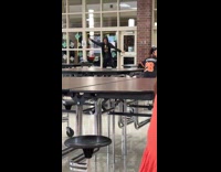 Man jacket hoodie tiktok dance inside cafeteria
