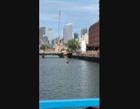 Couple rides kayak boat along open canal