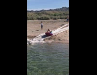 Man on Floaty Ring Launched on Ramp