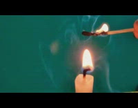 Slowmo fire drop from smoke lit candle