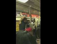 Red Shirt Man Pole Dances in Subway Car