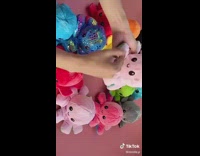 Girl flips baby octopus  toy inside out