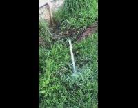 Water from hose froze like a pillar