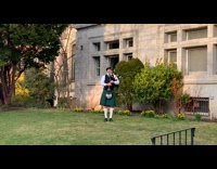 Green kilt guy bagpipes traditional Scottish clothing  