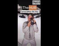 Man wearing goggles and holding video camera gets milk toss on face 