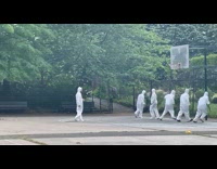 6 guys in white suits play basketball 