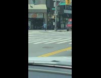 Lady walks with long stick social distancing 