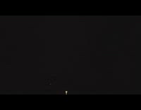 Takes video of the lightning in slow motion outside 