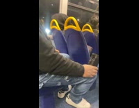 Woman filming stranger who is filming her