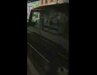 Homemade open car white pipes parked street