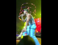 Artist Kisses One of His Audience in Concert