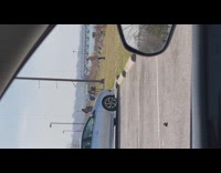 Girl khaki coat jump shot car laugh