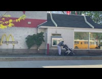 Guy pushes baby stroller mcdonalds drive through 