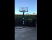 Guy dunks basketball hoop falls down