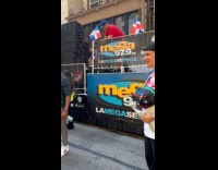 Dominican parade with cars and large speakers
