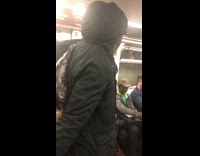 Guy singing god bless america on subway