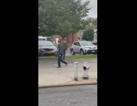 Collab winy - Man balances a board on a ball