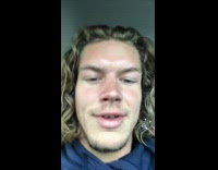 Guy in car bed floating in water 