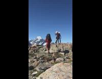 couple unicorn hat masks hiking