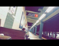 A man plays small piano train station