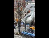 Submitter films inflatable floats on the street