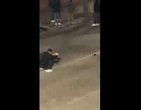 Man liquor bottle photo shoot middle street part 2