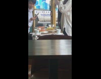 Food bloggers taking pictures of food