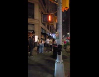 Submitter shows long line outside the bar