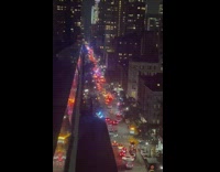 People Cross Street Simultaneously  as Vehicles Stop 