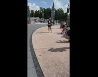 Woman black shirt raise palms disney world