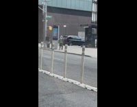 Man grey round hat dance on street
