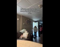 Woman surprising grandma with newborn