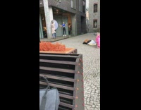 Girl blue shirt black leggings light reflector 