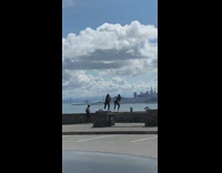 two girls ledge dance in sync