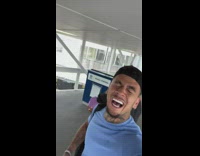 Tall guy hits security camera on ceiling with head 