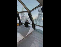 Hotel room made out of glass windows 
