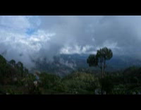 Fog and Clouds in Mountains Gets Blown Westward