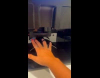 Woman tries a digital nail polish machine