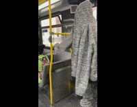 Guy does push ups on bus bar