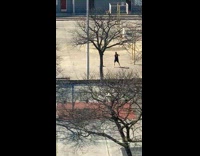 guy plays basketball empty court