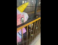 Pink unicorn carries up cart 