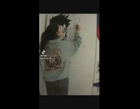 Girl paints one piece mural on closet 