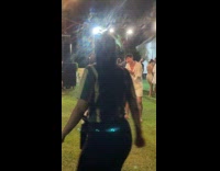 Man with drink sings at the party