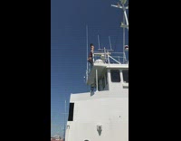 Guy front flip from boat green water 