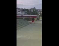 Red pants guy punches air cement steps 