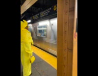 Woman all yellow outfit at train station