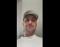 Guy has dog sit lay and spin in place