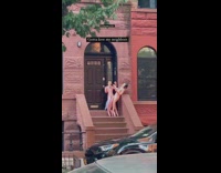2 inflatable people on apartment stairs 