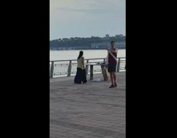 Woman yellow black dress tiktok dance bridge