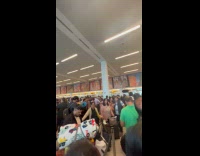 Collab WINY - Lots of people waiting in line JFK airport